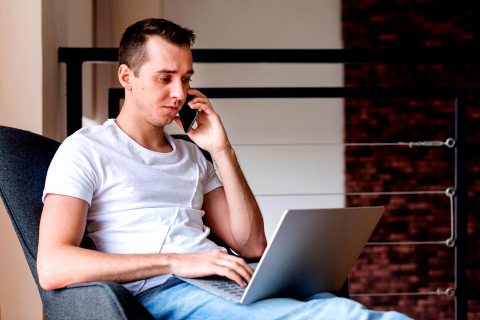 Students reviewing franchise financial documents during workshop session